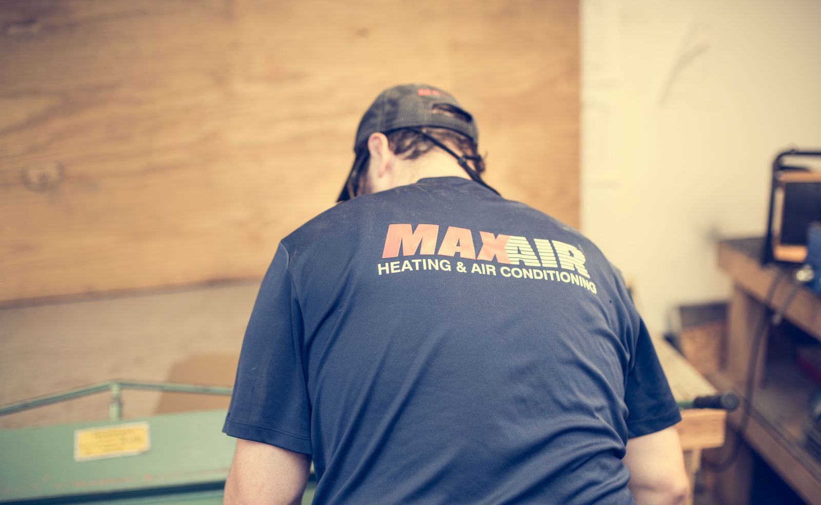 MaxAir Heating & Air Conditioning Contractor repairing Carrier HVAC Unit